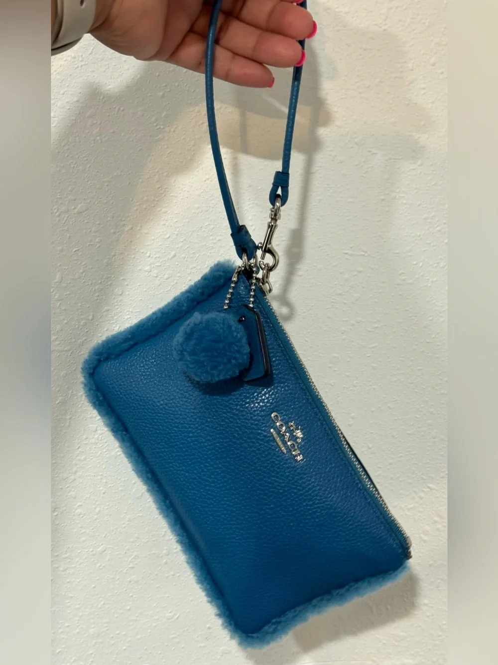 Coach Teal-Blue Faux-Shearling Leather Wristlet with Pom Charm